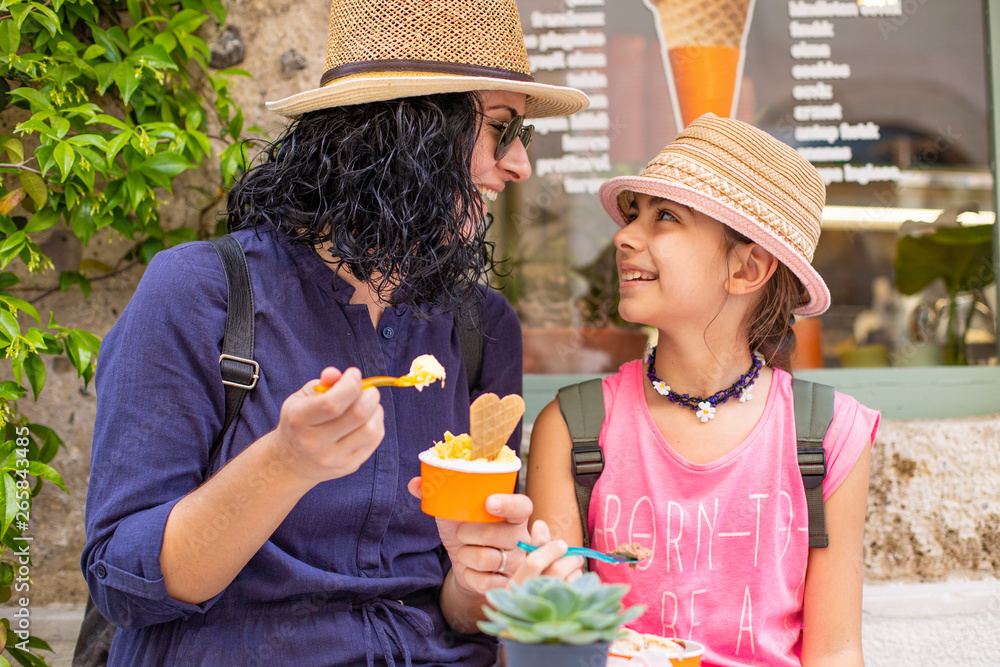 Fototapeta premium Happy girls are eating ice cream ( laughing )