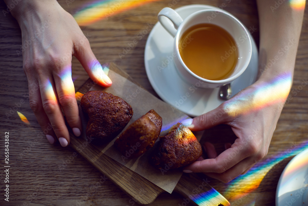 girl sitting in a restaurant with a Cup of tea girl sitting in a restaurant with a Cup of tea