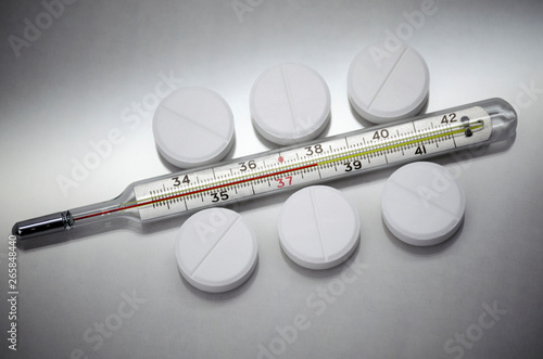 medical thermometer shows elevated temperature