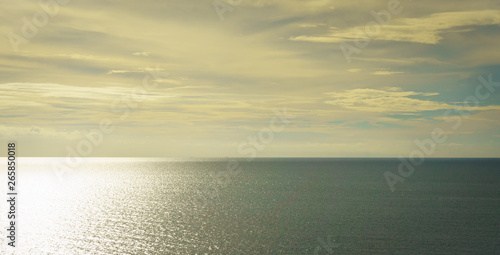 Fototapeta Naklejka Na Ścianę i Meble -  Sunlight at the sea. Horizontal photo with natural light and darkness