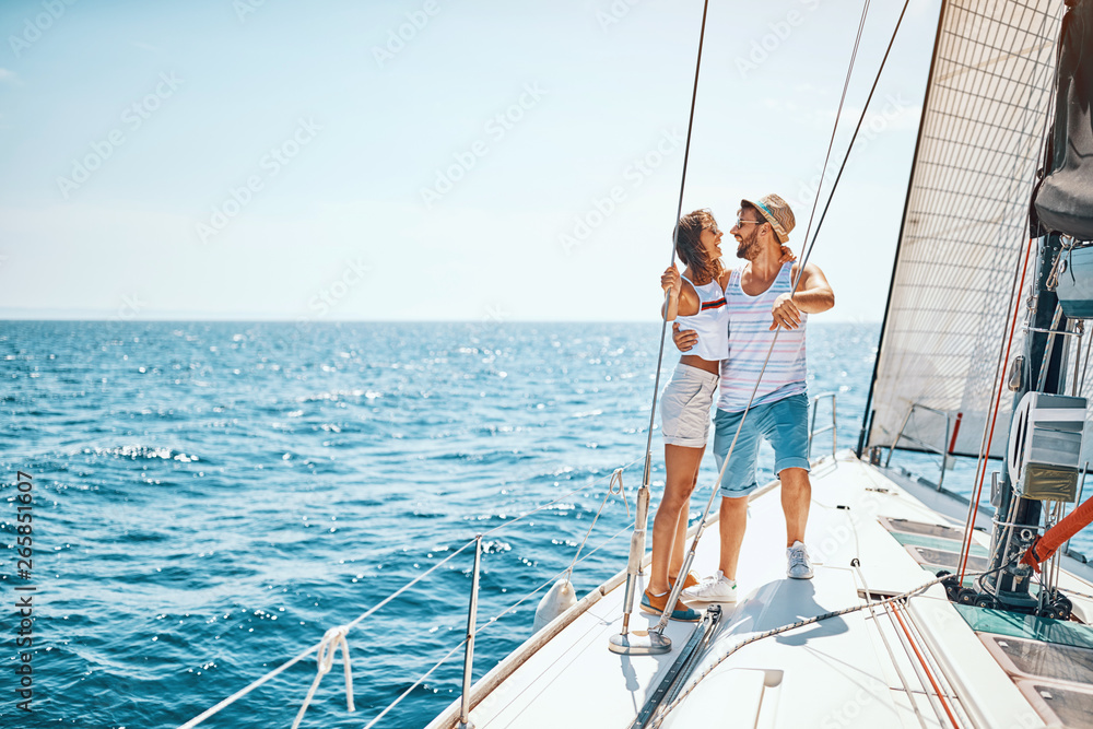 Man and woman in love - Romance on a sailboat. Man and woman in love - Romance on a sailboat.