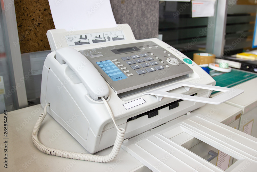 The fax machine for Sending documents in the office concept equipment needed in office The fax machine for Sending documents in the office concept equipment needed in office