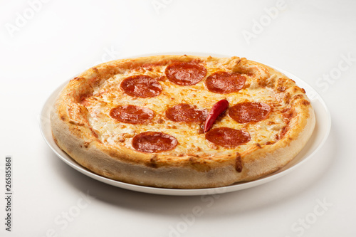 Pepperoni pizza on a white background.