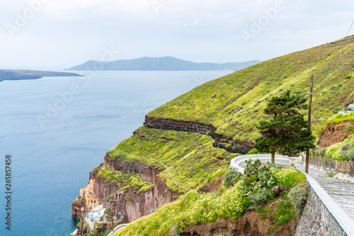 View of volcano caldera and Aegean Sea in Fira, Santorini landscape, Greece photo