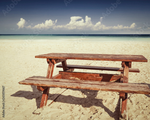 Table background on beach and summer time 