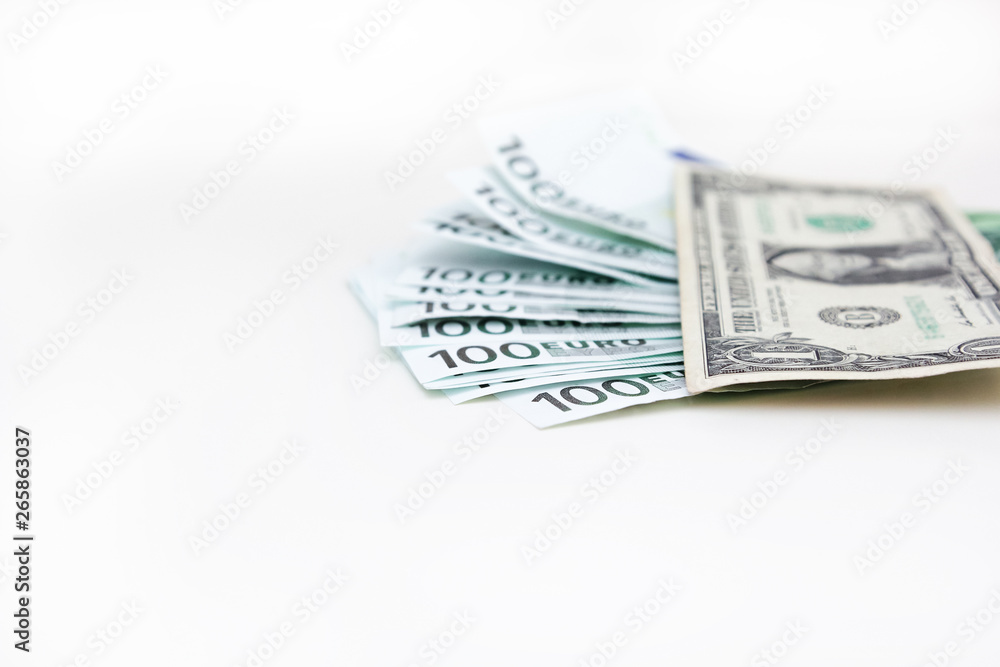 American dollar closeup of blue euro money banknotes. Money savings concept. Euro cash on white background. American dollar closeup of blue euro money banknotes. Money savings concept. Euro cash on white background.