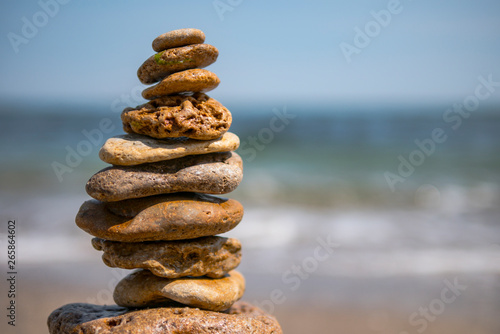 cairn on sea background. pyramid