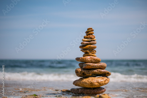 cairn on sea background. pyramid