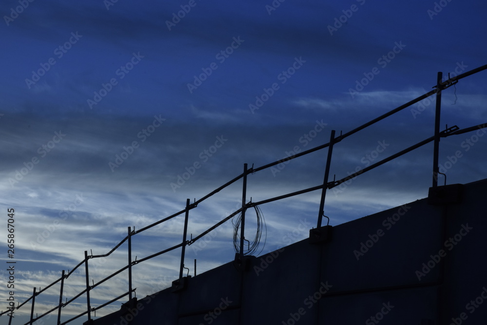 fence on background of blue sky