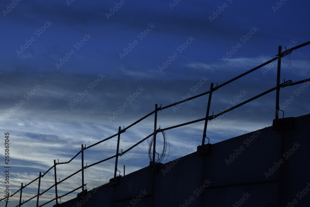 fence on background of blue sky fence on background of blue sky
