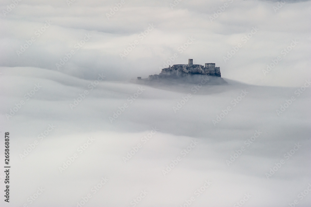 Unique Spis (Spiš, Spišský) castle in the mist. Second biggest castle in Middle Europe, Unesco Wold Heritage, Slovakia Unique Spis (Spiš, Spišský) castle in the mist. Second biggest castle in Middle Europe, Unesco Wold Heritage, Slovakia