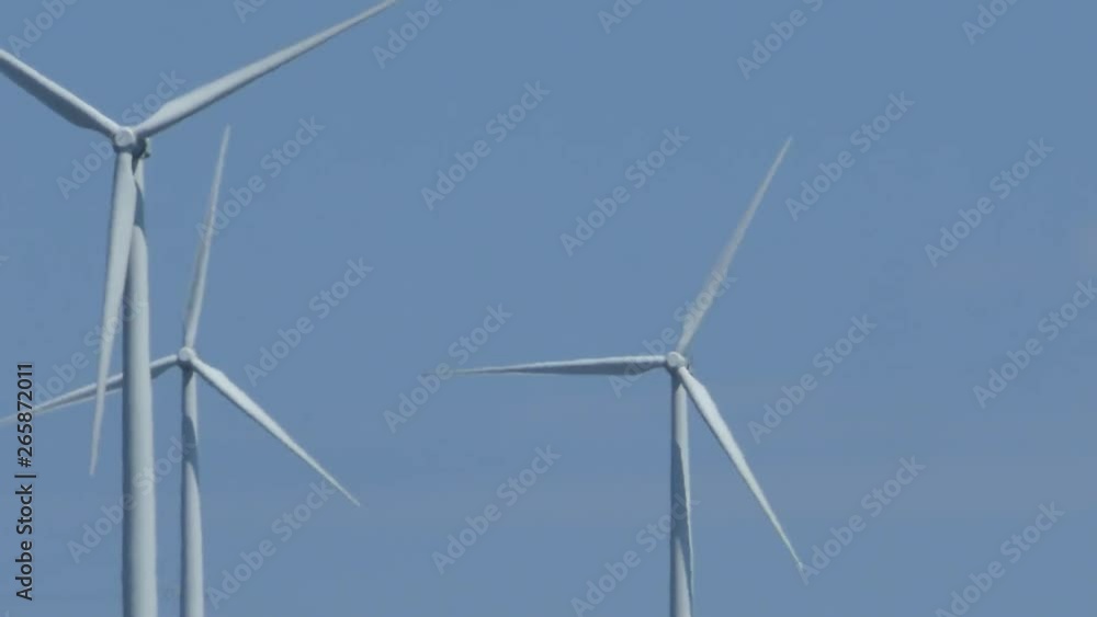 wind turbine against blue sky wind turbine against blue sky