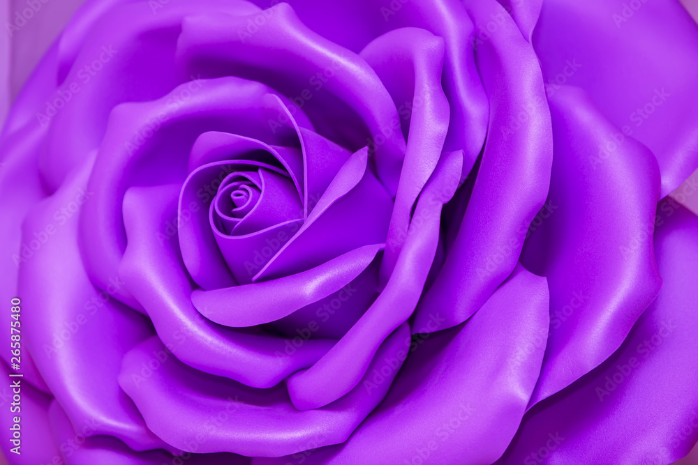 Huge Artificial Violet Rose Background.Flower closeup Huge Artificial Violet Rose Background.Flower closeup