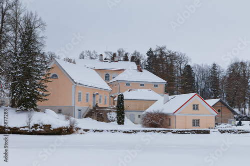 An old manor house Vihula in Estonia, Lahemaa park. Beautiful winter views with bridges and frozen ponds. photo