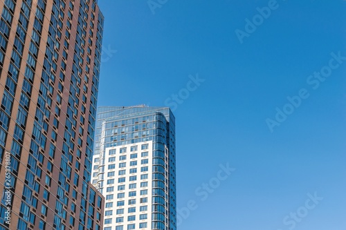 Facade of some very tall apartment buildings in Downtown Brooklyn, on a beautiful, sunny summer day, New York City, NY, USA
