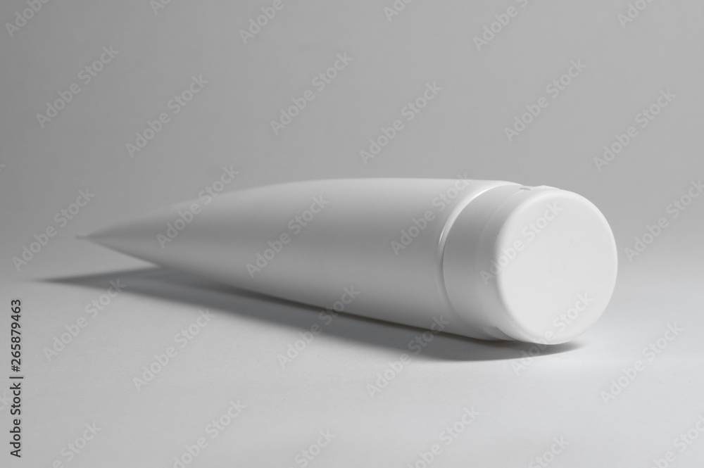white cosmetic tube for creams