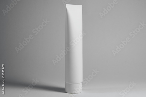 white cosmetic tube for creams