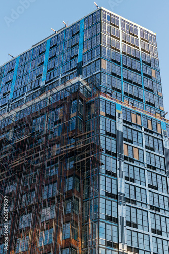 Tall modern building in Downtown Brooklyn, still under construction, New York City, NY, USA