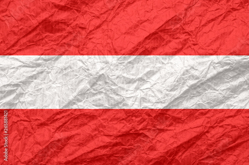 Austria flag on old crumpled craft paper.