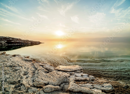 Salt Formations on the shore of the Dead Sea at sunset, Karak Governorate, Jordan photo