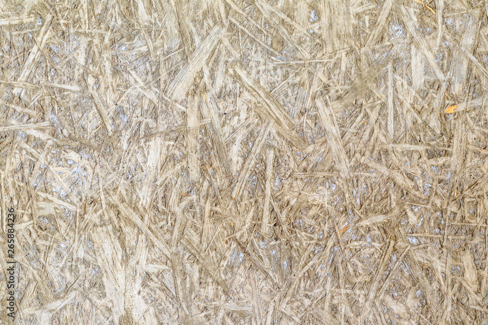 texture. imprint on the concrete screed osb plate. daylight. there is tinting. texture. imprint on the concrete screed osb plate. daylight. there is tinting.