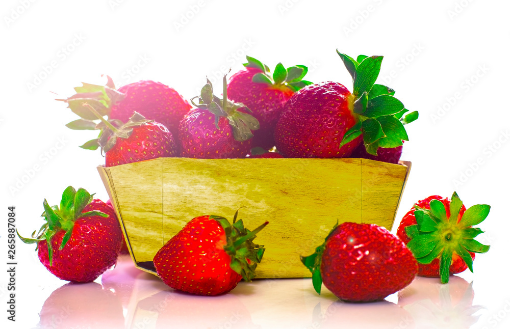 Delicious ripe strawberry in wooden basket isolated on white background Delicious ripe strawberry in wooden basket isolated on white background