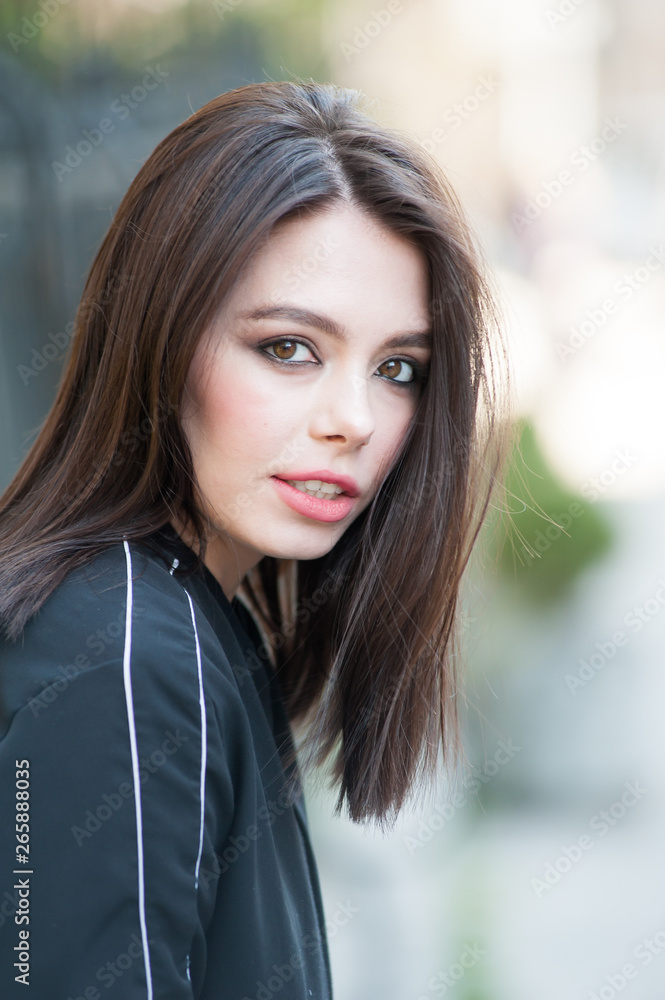 Close up portrait of beautiful young brunette woman Close up portrait of beautiful young brunette woman
