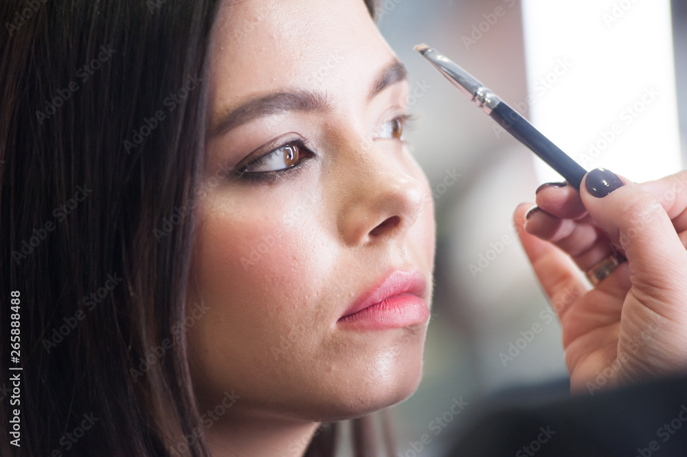 Make up process of beautiful young woman Make up process of beautiful young woman