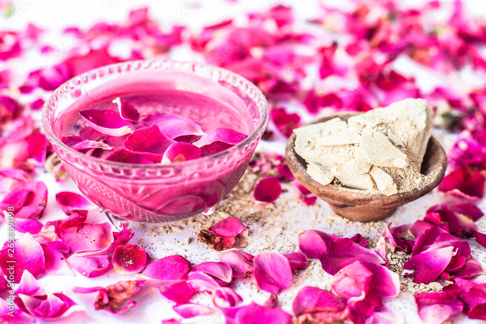 Rose flower face pack isolated with rose petals well mixed with mulpani