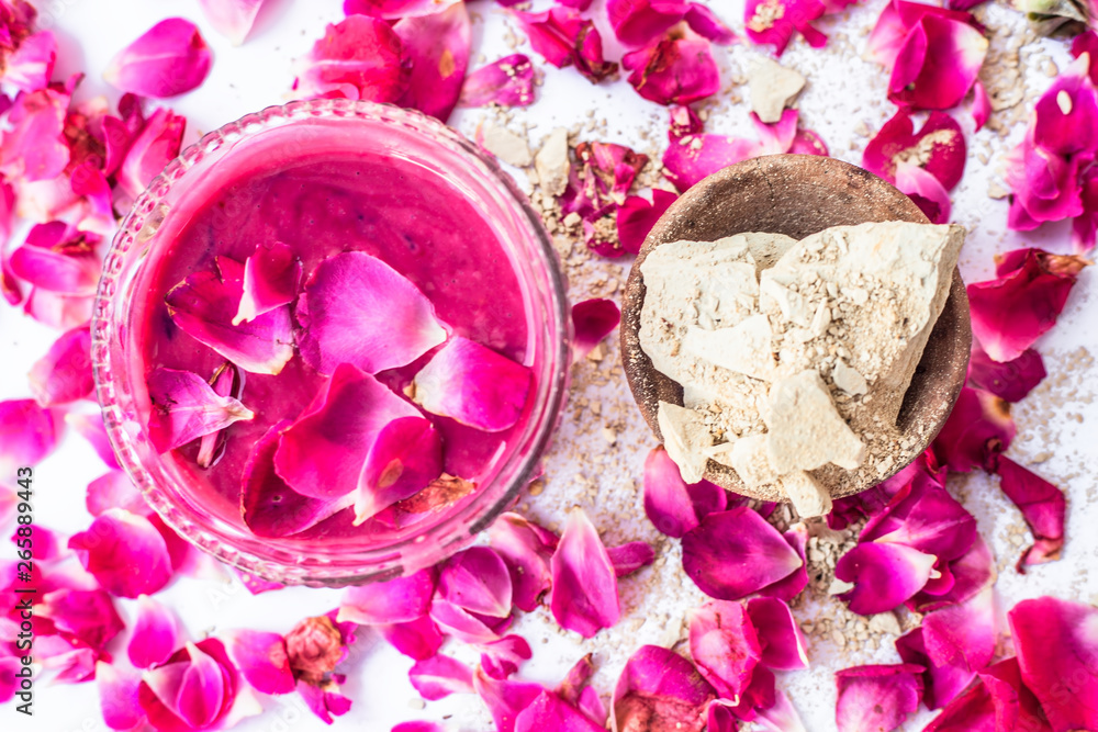 Rose flower face pack isolated with rose petals well mixed with mulpani