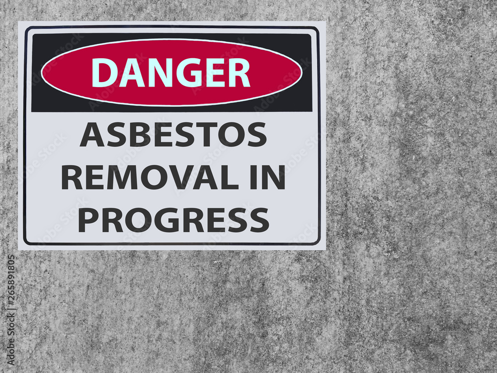 the sticker Sign danger asbestos removal on the plaster asbestos wall the sticker Sign danger asbestos removal on the plaster asbestos wall