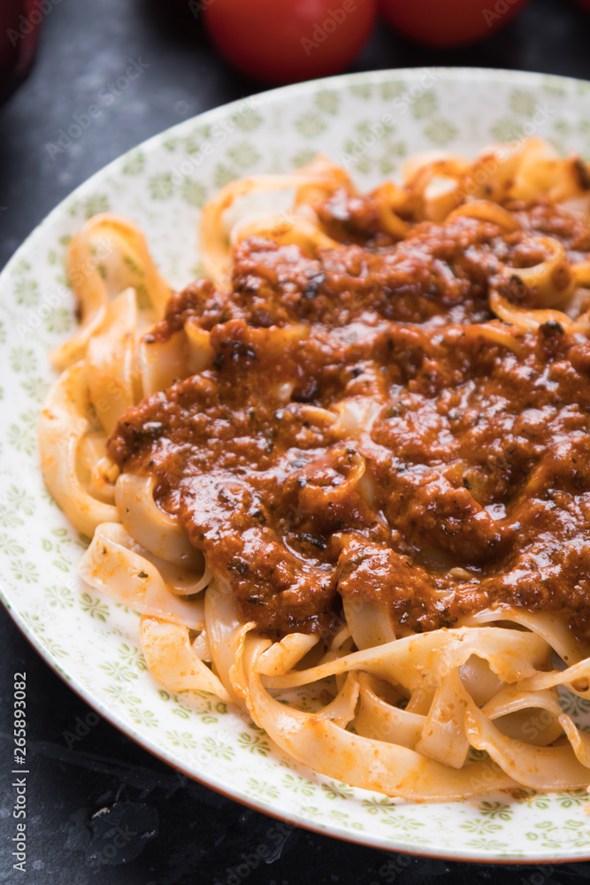 Italian ragu bolognese with flat fettuccine pasta Italian ragu bolognese with flat fettuccine pasta