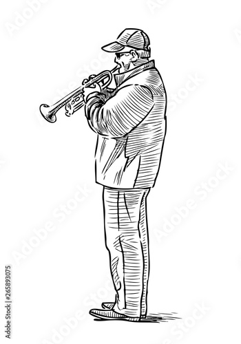 Street musician plays the trumpet