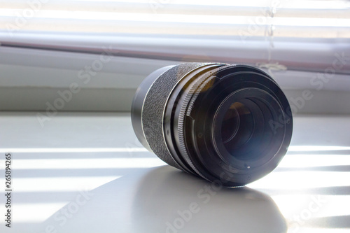 Closeup of old retro Photographic camera lens for film camera