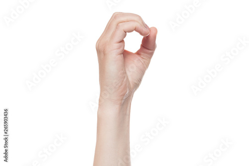 A hand sign meaning round, hole, zero. on white background