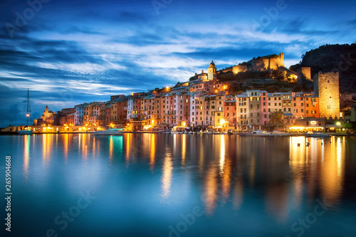 Beautiful coastal town Portovenere in Cinque Terre national park, Liguria, Italy. Famous small Italian city, Cityscape in Sunset time. © Viktar