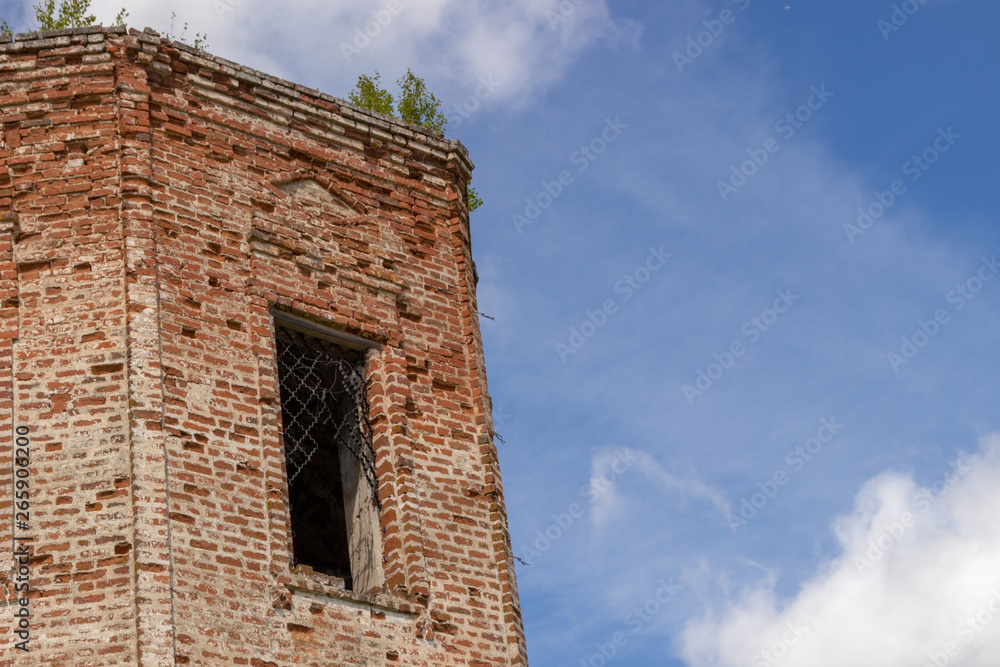 Fototapeta premium The walls of the Russian destroyed church of red brick