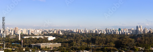 Panoramic view of the city of Sao Paulo with the Ibirapuera park and the Legislative Assembly of Sao Paulo in the foreground.