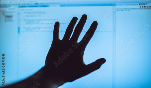 a man typing an IT SCR Code photo