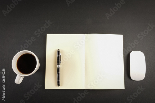 Office leather desk table with coffee cup and note. Top view with copy space