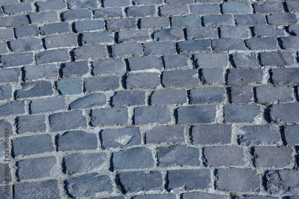 Stone pavement texture. Old cobblestone abstract background. Close up. Stone pavement texture. Old cobblestone abstract background. Close up.