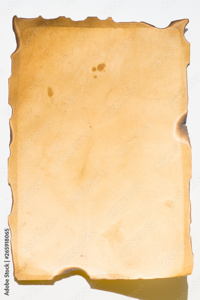 Old sheet of paper that has burnt edges Old sheet of paper that has burnt edges