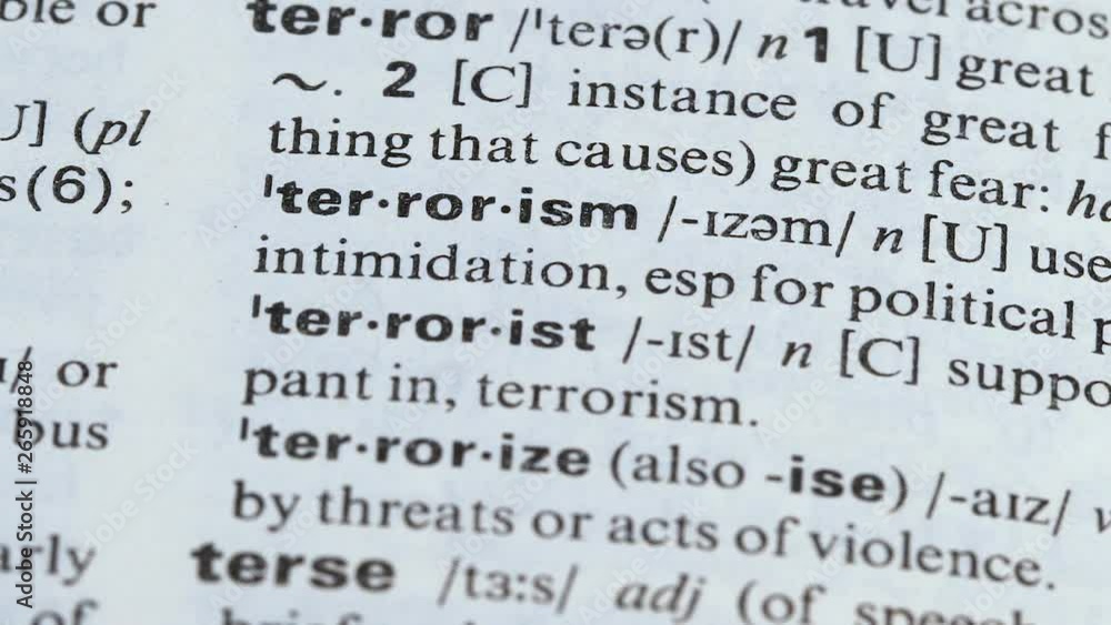Terrorism word pointed in dictionary, supporting violence, using aggression Terrorism word pointed in dictionary, supporting violence, using aggression