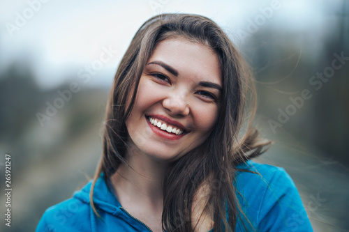 close up Portrait of beautiful mixed race Caucasian young woman with dark eyes and hair