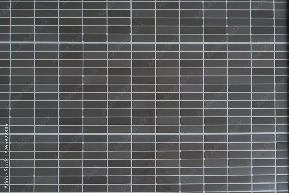 Seamless modern brown/grey small mosaic tiles texture pattern background. Seamless modern brown/grey small mosaic tiles texture pattern background.