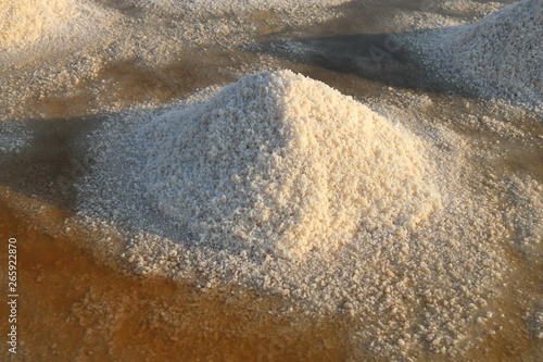 Sea salt in salt farm ready for harvest at Ban Laem, Phetchaburi Province, Thailand