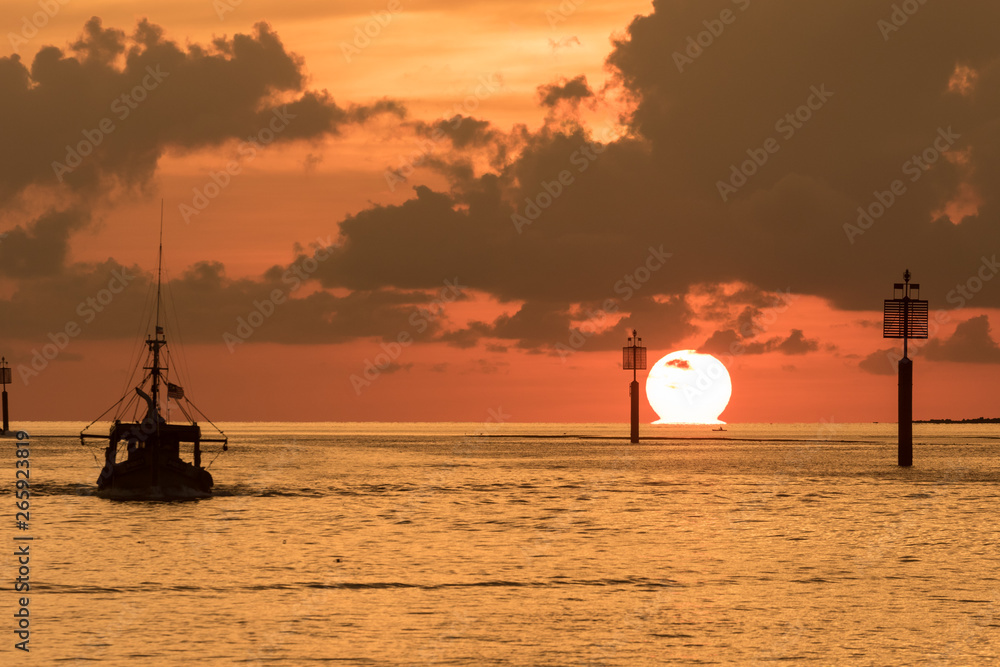 Beautiful sunset view sun down at Waterfront Kota Kinabalu, Sabah, Malaysia, The famous spot for tourist see sunset