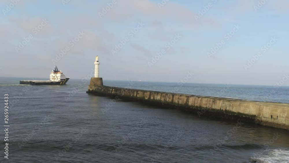 Aberdeen Lighthouse in front of Blue Sky and Clouds Aberdeen Lighthouse in front of Blue Sky and Clouds