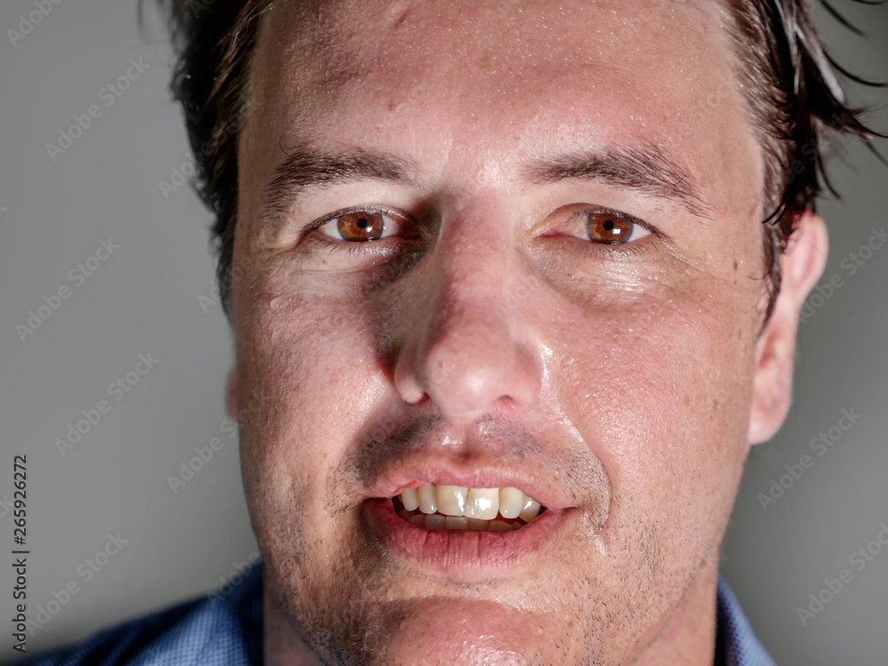 close up portrait of young attractive and confident entrepreneur man in casual shirt smiling happy and positive looking at the camera in business success close up portrait of young attractive and confident entrepreneur man in casual shirt smiling happy and positive looking at the camera in business success