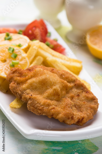 Breaded cutlet with french fries